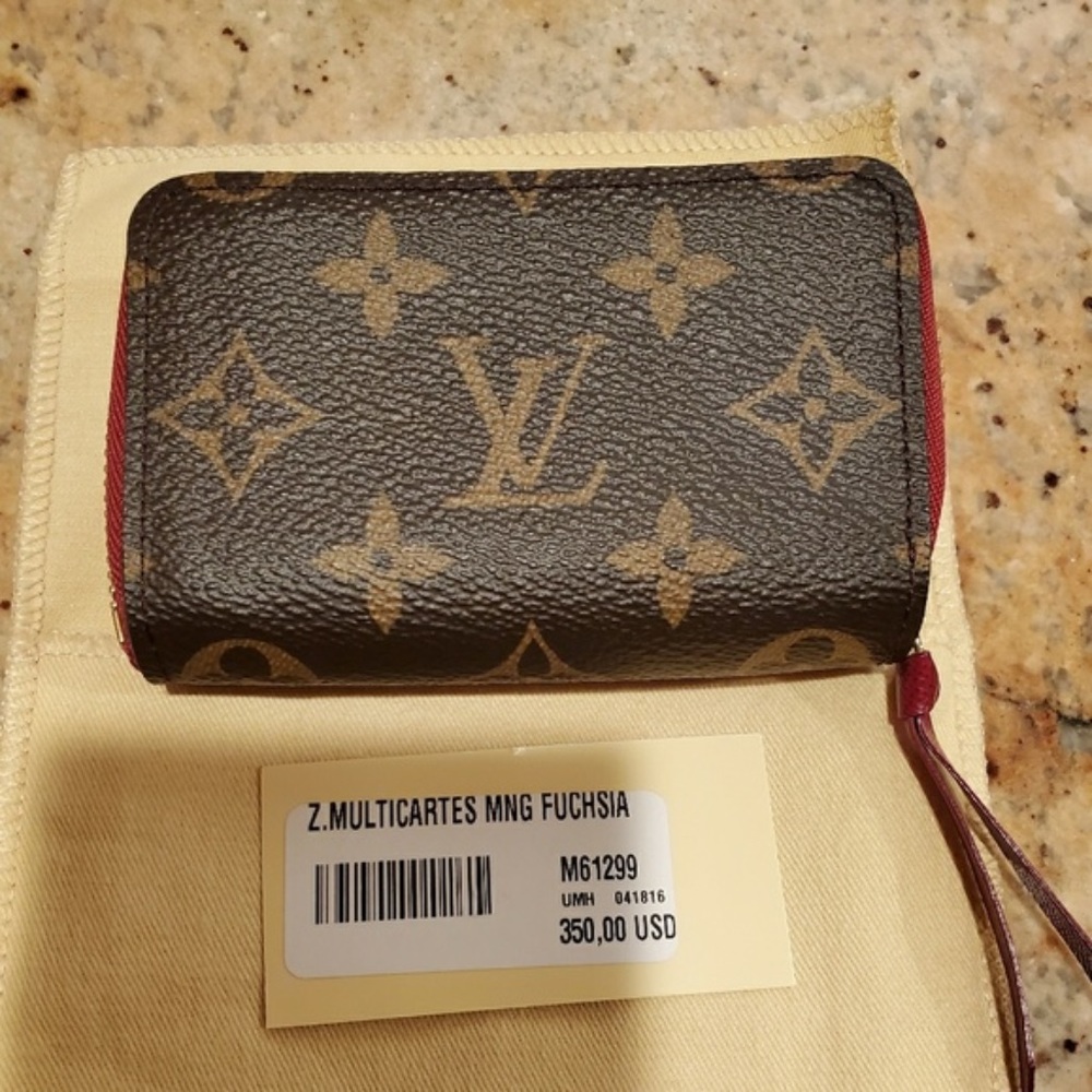 Louis Vuitton Zippy Multicartes Fuschia Like New